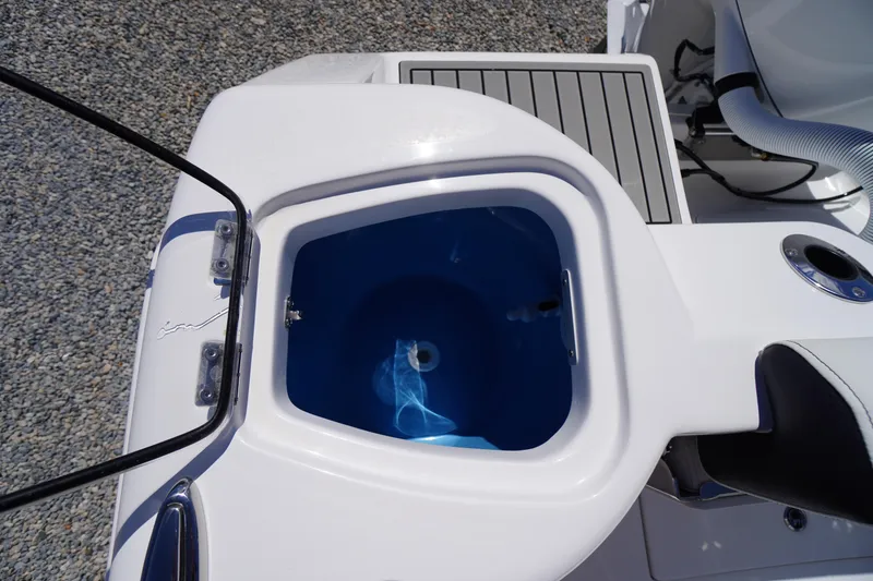 Slide: The Image of Livewell on 2026 Tidewater 220 CC Adventure boat, featuring sleek design and functionality. - 48