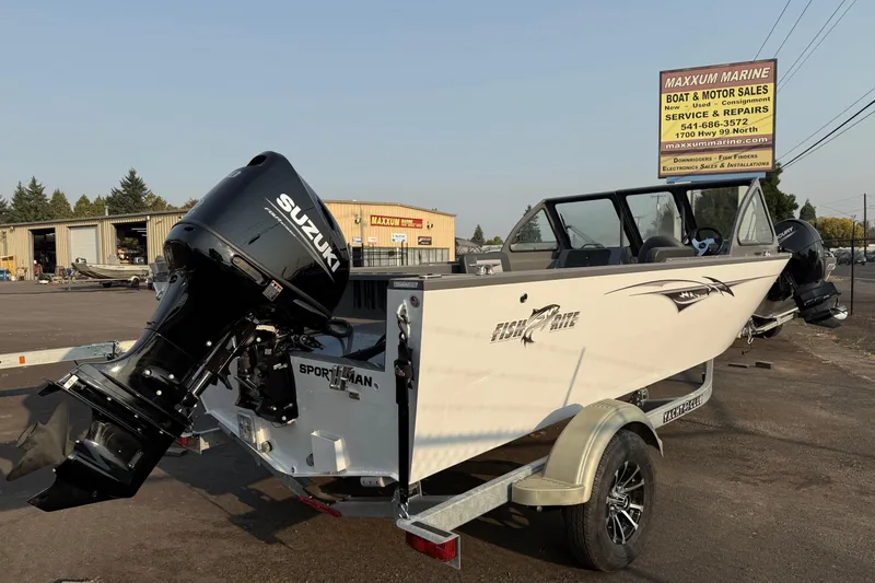 Slide: The Image of 2026 Fish Rite Sportsman 20 boat with Suzuki outboard at Maxxum Marine dealership. - 2