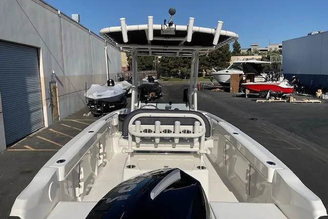 Slide: The Image of 2026 Bayliner Trophy T22CC boat interior with open storage compartments. - 11