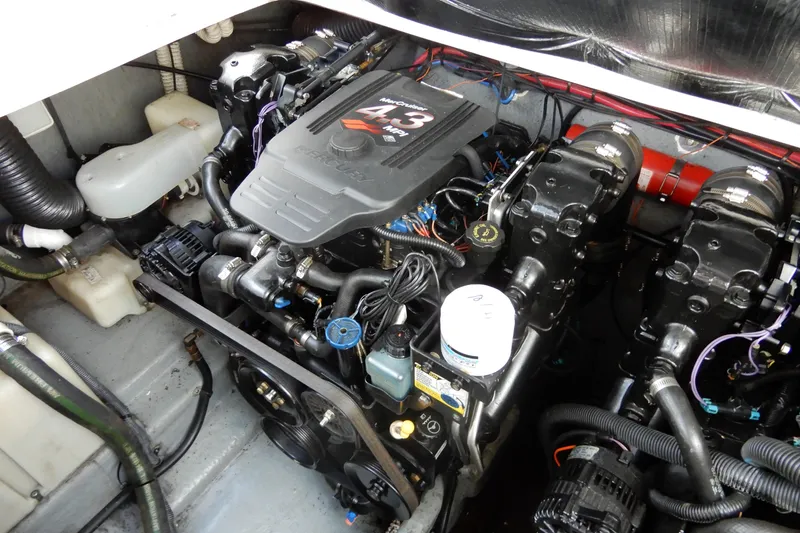 Slide: The Image of Engine compartment of 2004 Sea Ray 280 Sundancer boat, featuring MerCruiser 4.3L engine. - 37