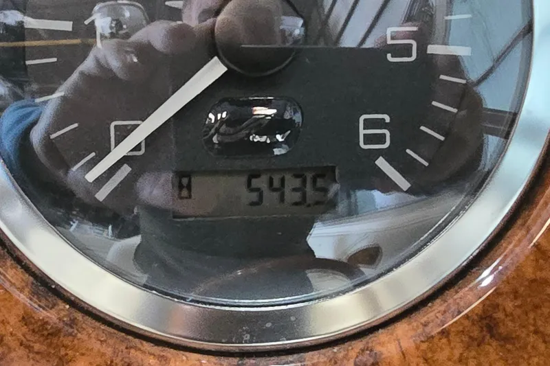 Slide: The Image of Close-up of a 1998 Sea Ray 280 Sun Sport boat gauge displaying 543.5 hours. - 33