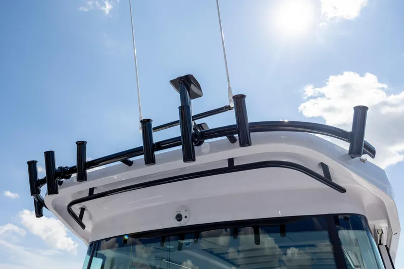 Slide: The Image of Rooftop view of 2024 Axopar 37 XC boat under a sunny sky. - 48