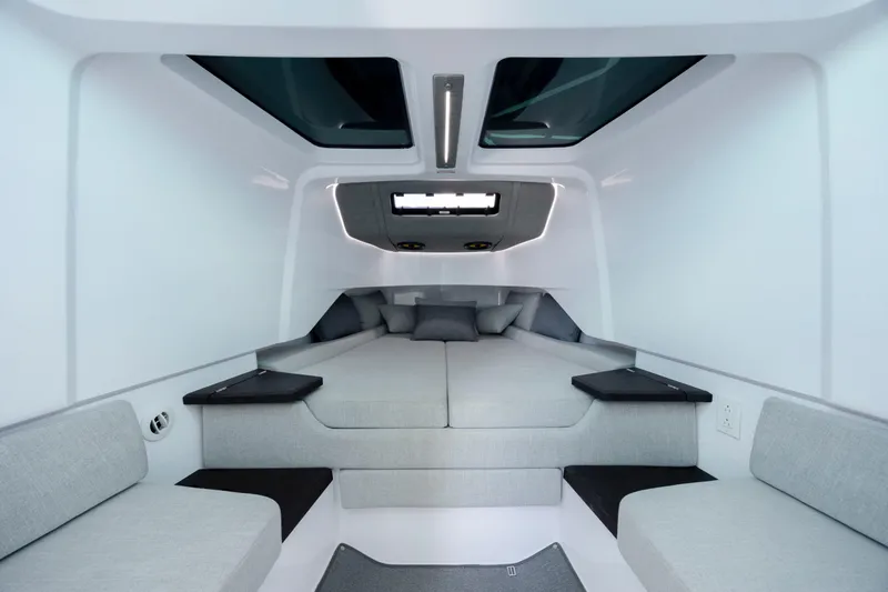 Slide: The Image of Luxurious interior of 2024 Axopar 37 XC boat with modern seating and skylights. - 63