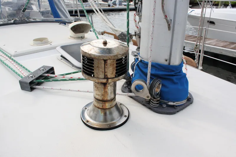 Slide: The Image of 1988 Pearson 31 sailboat deck with winch and rigging details. - 10