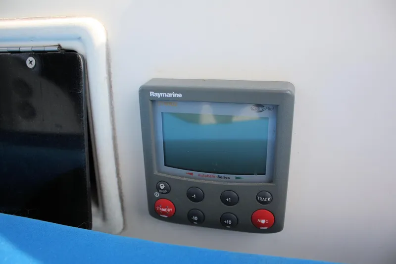 Slide: The Image of Raymarine autopilot control on 1988 Pearson 31 sailboat dashboard. - 19