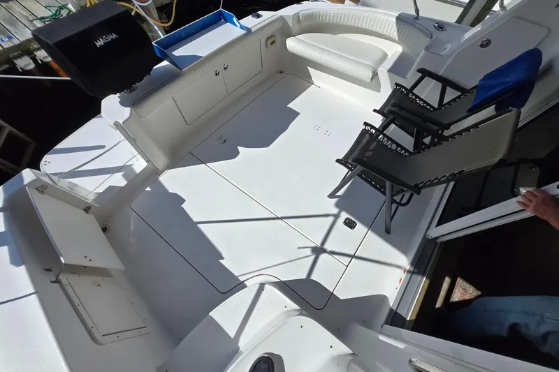 Slide: The Image of 2002 Silverton 351 Sedan Cruiser deck with seating and grill. - 20