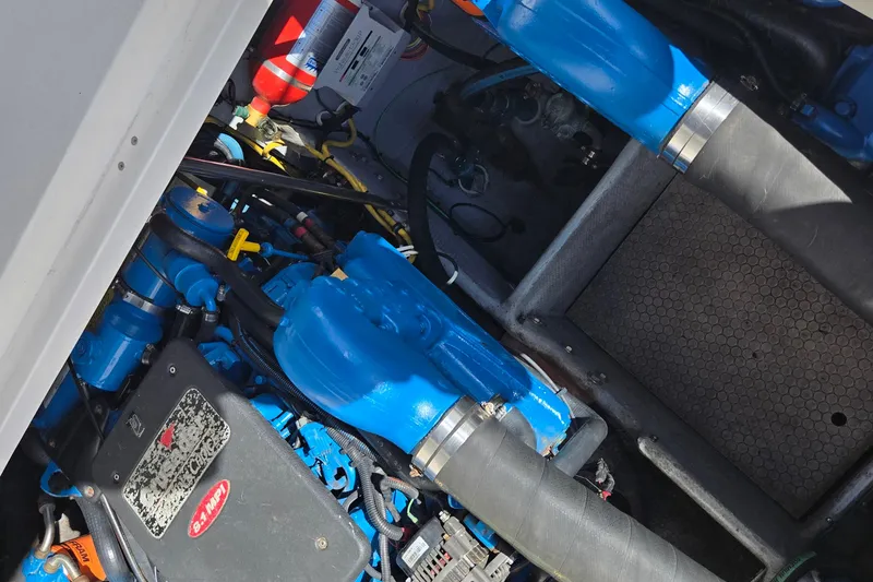 Slide: The Image of Engine compartment of a 2002 Silverton 351 Sedan Cruiser with visible components. - 26