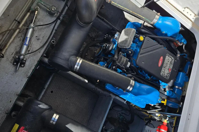 Slide: The Image of Engine compartment of a 2002 Silverton 351 Sedan Cruiser, showcasing mechanical components. - 3