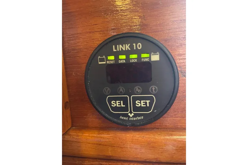 Slide: The Image of Digital display panel on a 1977 Custom Bodega 30 boat, featuring control buttons and indicators. - 31