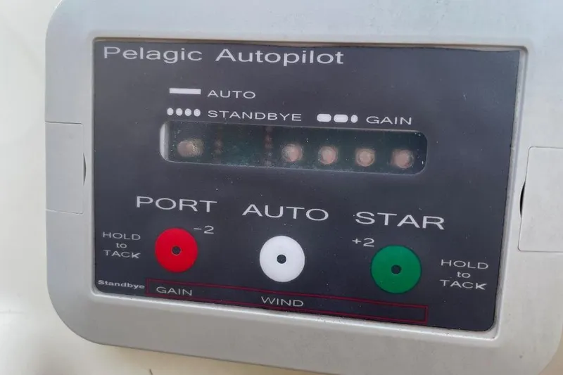 Slide: The Image of Pelagic Autopilot control panel on a 1977 Custom Bodega 30 boat. - 32