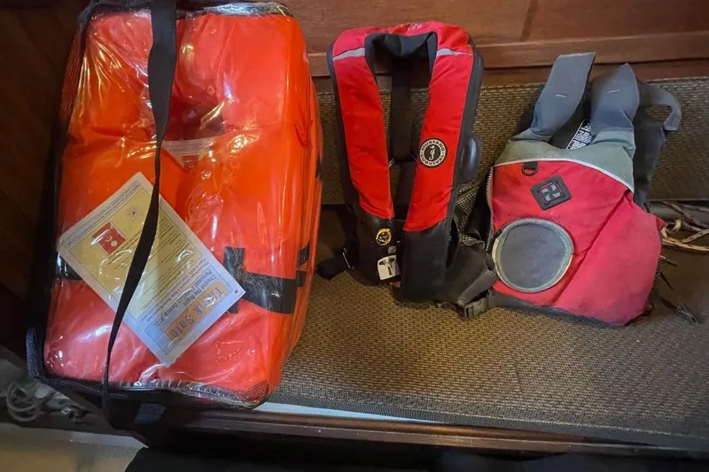 Slide: The Image of Life jackets and safety gear on a Custom Bodega 30, 1977 model. - 34