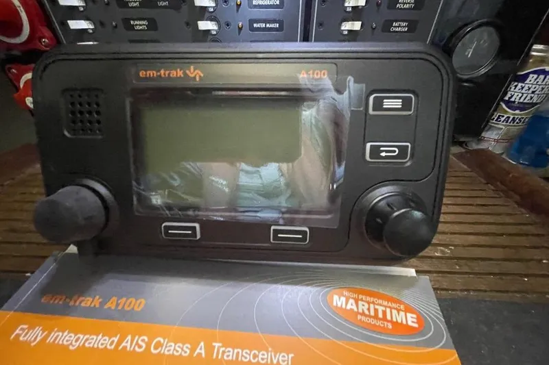 Slide: The Image of Em-trak A100 AIS Class A transceiver on a Custom Bodega 30, 1977 model. - 35