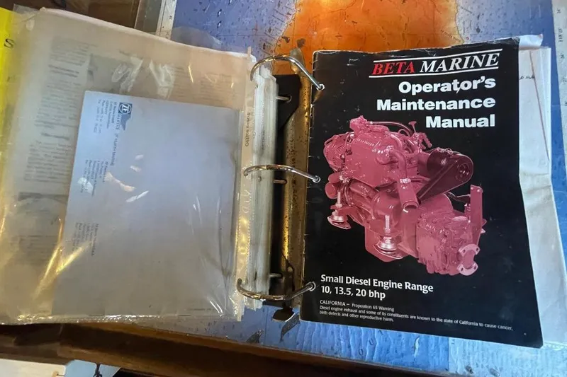 Slide: The Image of Binder with Beta Marine operator's maintenance manual for small diesel engines, Custom Bodega 30, 1977. - 39