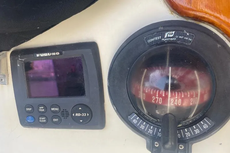 Slide: The Image of Furuno RD-33 display and Plastimo compass on 1977 Custom Bodega 30 boat. - 49