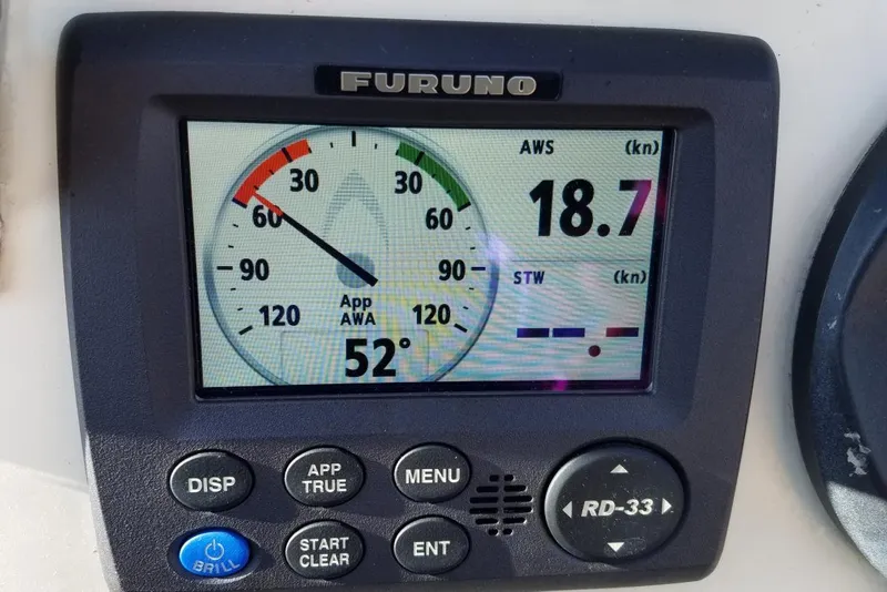 Slide: The Image of Furuno marine display showing wind angle and speed on Custom Bodega 30, 1977 model. - 50