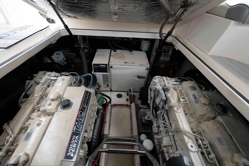 Slide: The Image of Engine room of 2007 Cruisers Yachts 460 Express with Volvo Penta engines and generator. - 25
