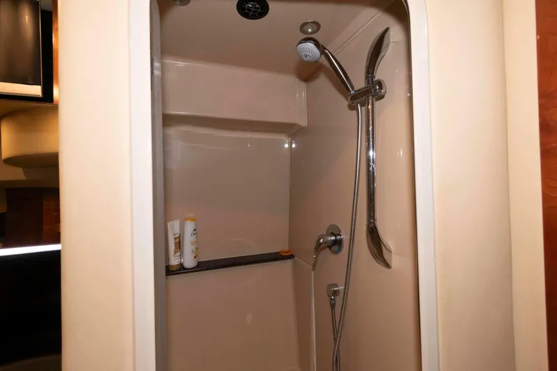 Slide: The Image of Shower area in 2007 Cruisers Yachts 460 Express, featuring modern fixtures and toiletries. - 18