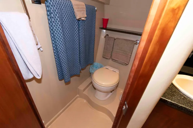 Slide: The Image of Bathroom interior of 2007 Cruisers Yachts 460 Express with shower and toilet. - 19