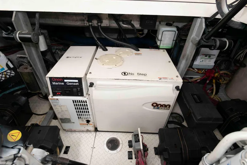 Slide: The Image of Engine room of 2007 Cruisers Yachts 460 Express with Onan marine generator. - 26