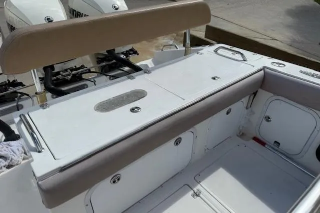 Slide: The Image of 2005 Dakota 36 CC Forward Cuddy Cabin boat interior with seating and storage compartments. - 10