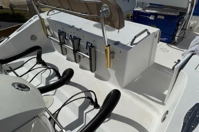 Slide: The Image of 2005 Dakota 36 CC Forward Cuddy Cabin boat deck with seating and equipment. - 11