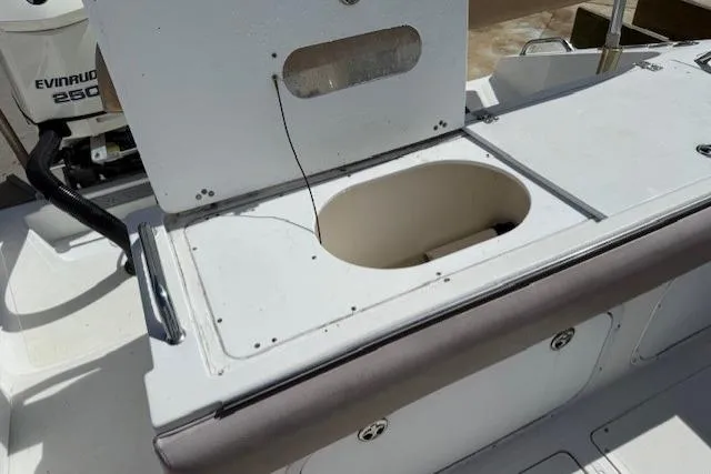 Slide: The Image of 2005 Dakota 36 CC Forward Cuddy Cabin boat with open storage compartment. - 12