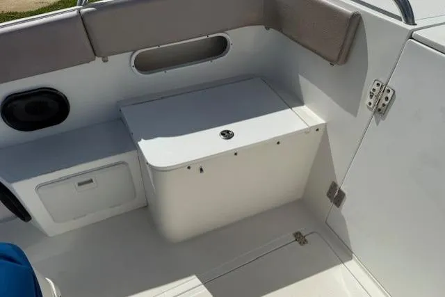 Slide: The Image of 2005 Dakota 36 CC Forward Cuddy Cabin interior with seating and storage. - 16