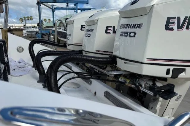 Slide: The Image of Outboard engines on a 2005 Dakota 36 CC Forward Cuddy Cabin boat. - 2