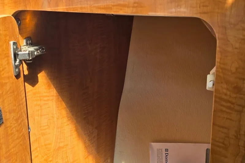 Slide: The Image of Control panel on 2004 Regal Commodore 3260 boat, featuring liquid level monitor and system indicators. - 26