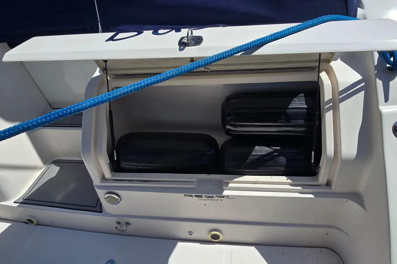 Slide: The Image of Electrical connections on a 2004 Regal Commodore 3260 boat with yellow power cords. - 6