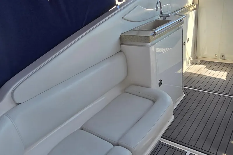 Slide: The Image of 2004 Regal Commodore 3260 boat sink with faucet and countertop detail. - 9