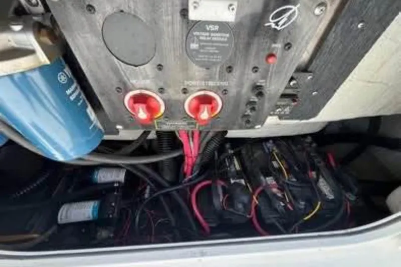 Slide: The Image of Electrical panel and wiring inside a 2011 Sailfish 2660 WAC boat. - 4