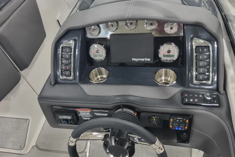 Slide: The Image of Dashboard of 2026 Formula 270 Bowrider with Raymarine display and control panel. - 13