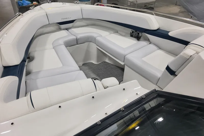 Slide: The Image of 2026 Formula 270 Bowrider interior with white seating and modern design. - 14