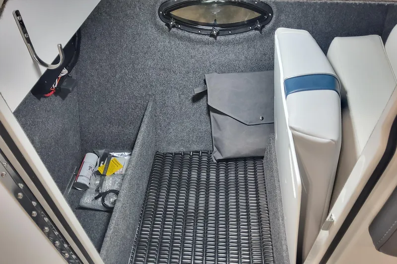 Slide: The Image of Interior cabin of 2026 Formula 270 Bowrider boat with storage and seating. - 17