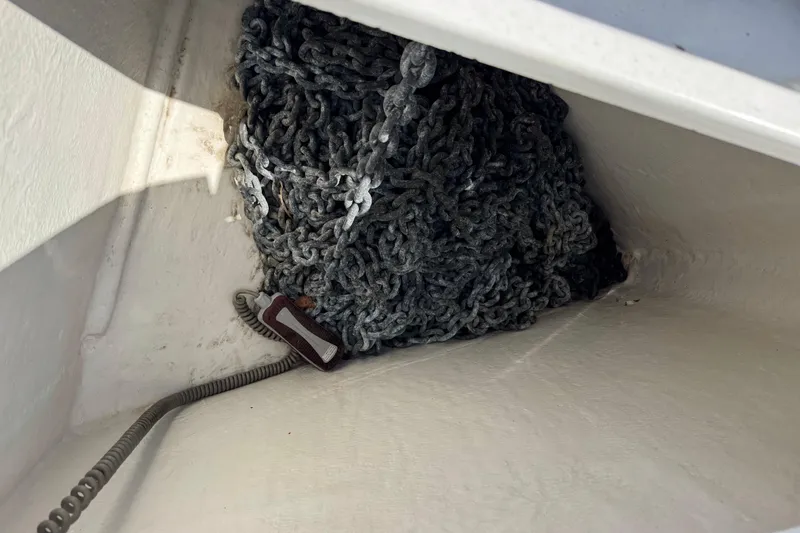 Slide: The Image of Anchor chain storage in a 2013 Beneteau Oceanis 45 sailboat compartment. - 22