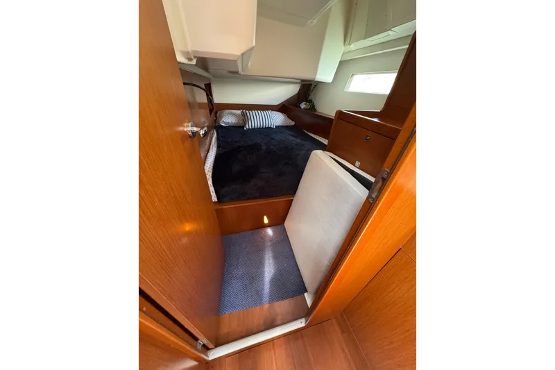 Slide: The Image of Cozy cabin interior of 2013 Beneteau Oceanis 45 yacht with wooden finish. - 40