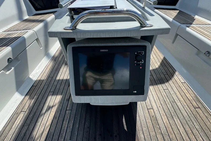 Slide: The Image of Cockpit of 2013 Beneteau Oceanis 45 with Simrad navigation display. - 9
