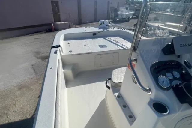 Slide: The Image of 2021 Carolina Skiff 21 LS boat interior with console and seating area. - 11