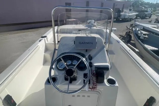 Slide: The Image of 2021 Carolina Skiff 21 LS boat interior with Garmin navigation system. - 12