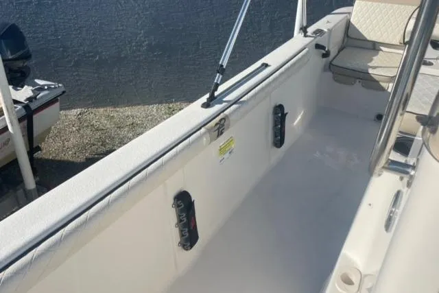 Slide: The Image of 2021 Carolina Skiff 21 LS boat interior with seating and railing. - 16