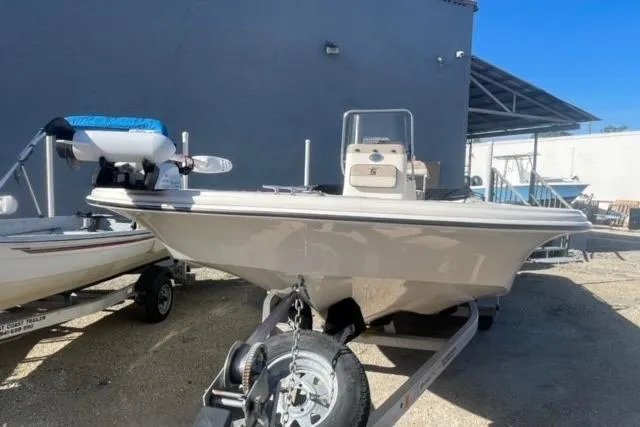 Slide: The Image of 2021 Carolina Skiff 21 LS boat on trailer, parked outdoors. - 5