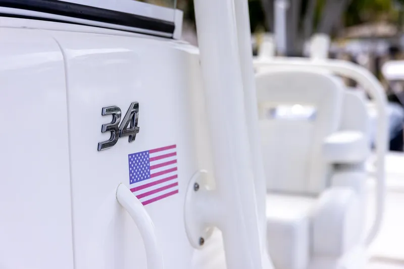 Slide: The Image of 2019 Regulator 34 boat with American flag decal. - 13