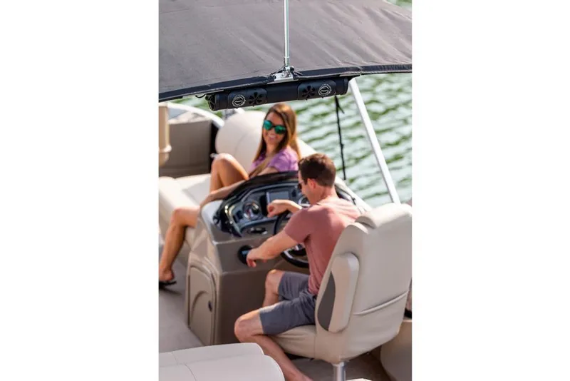 Slide: The Image of 2021 Sun Tracker Fishin' Barge 24 DLX with passengers enjoying a sunny day on the water. - 15