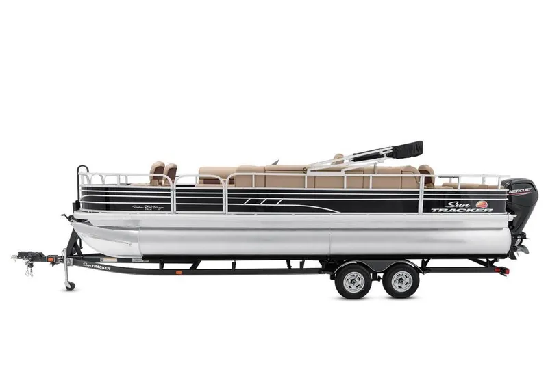 Slide: The Image of 2021 Sun Tracker Fishin' Barge 24 DLX pontoon boat on trailer, side view. - 6