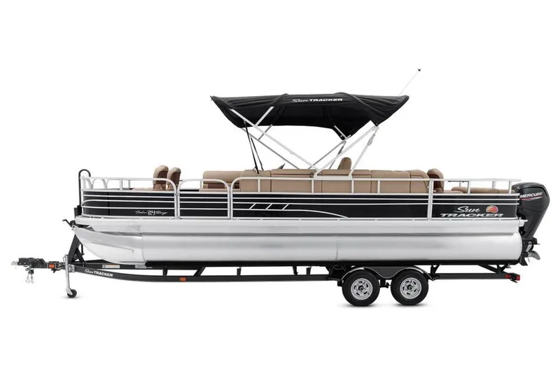Slide: The Image of 2021 Sun Tracker Fishin' Barge 24 DLX pontoon boat with canopy and trailer. - 9