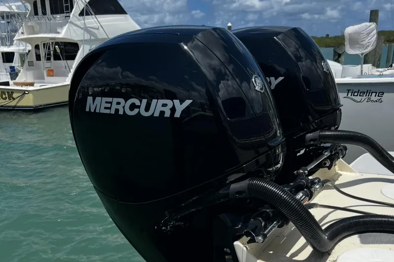 Slide: The Image of Twin Mercury outboard motors on a Parker 2500 Special Edition boat, 2002 model. - 5