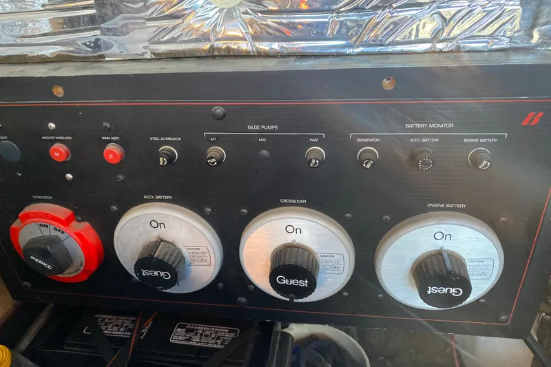 Slide: The Image of Control panel of a 1989 Bayliner 3888 Motoryacht with battery and bilge pump switches. - 30