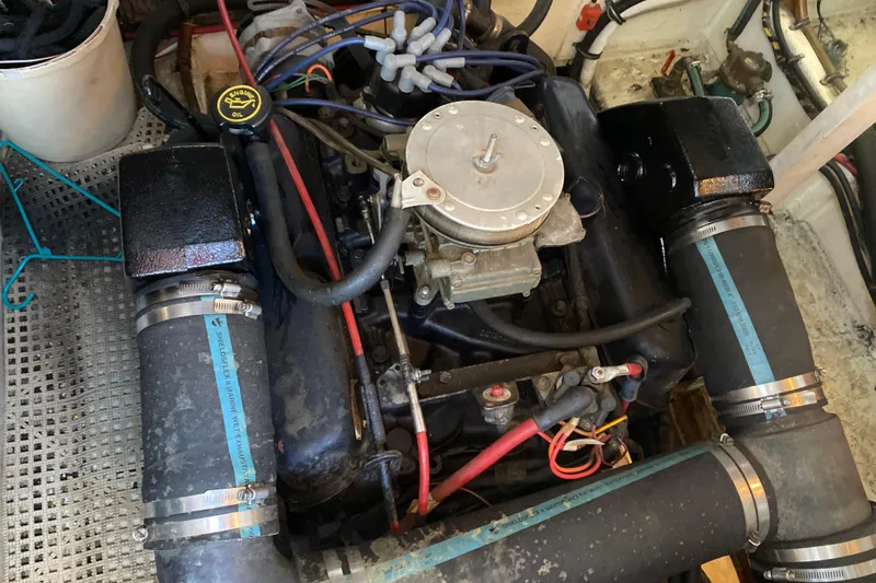 Slide: The Image of Engine compartment of a 1989 Bayliner 3888 Motoryacht, showing detailed components and wiring. - 31