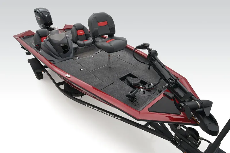 Slide: The Image of 2026 Tracker Pro Team 175 boat storage compartment with open lid, showcasing interior space. - 10